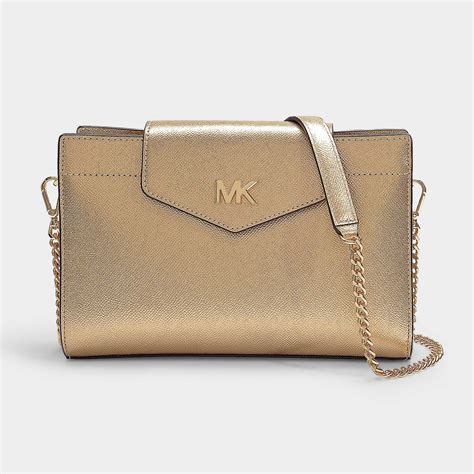 michael kors gold daisy handbag|Michael Kors gold crossbody bag.